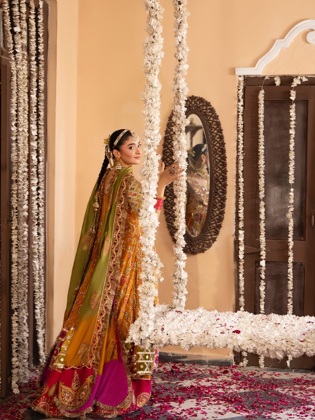 Gulnar Mehndi Lehenga – Mustard Orange Angrakha & Fuchsia Pink Bridal Lehenga Choli with Gota Work
