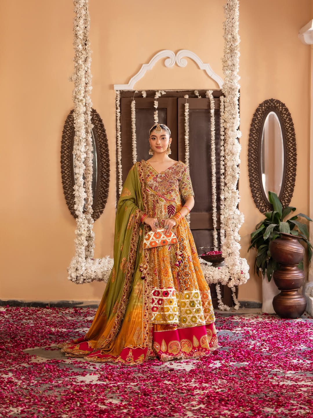 Gulnar Mehndi Lehenga – Mustard Orange Angrakha & Fuchsia Pink Bridal Lehenga Choli with Gota Work