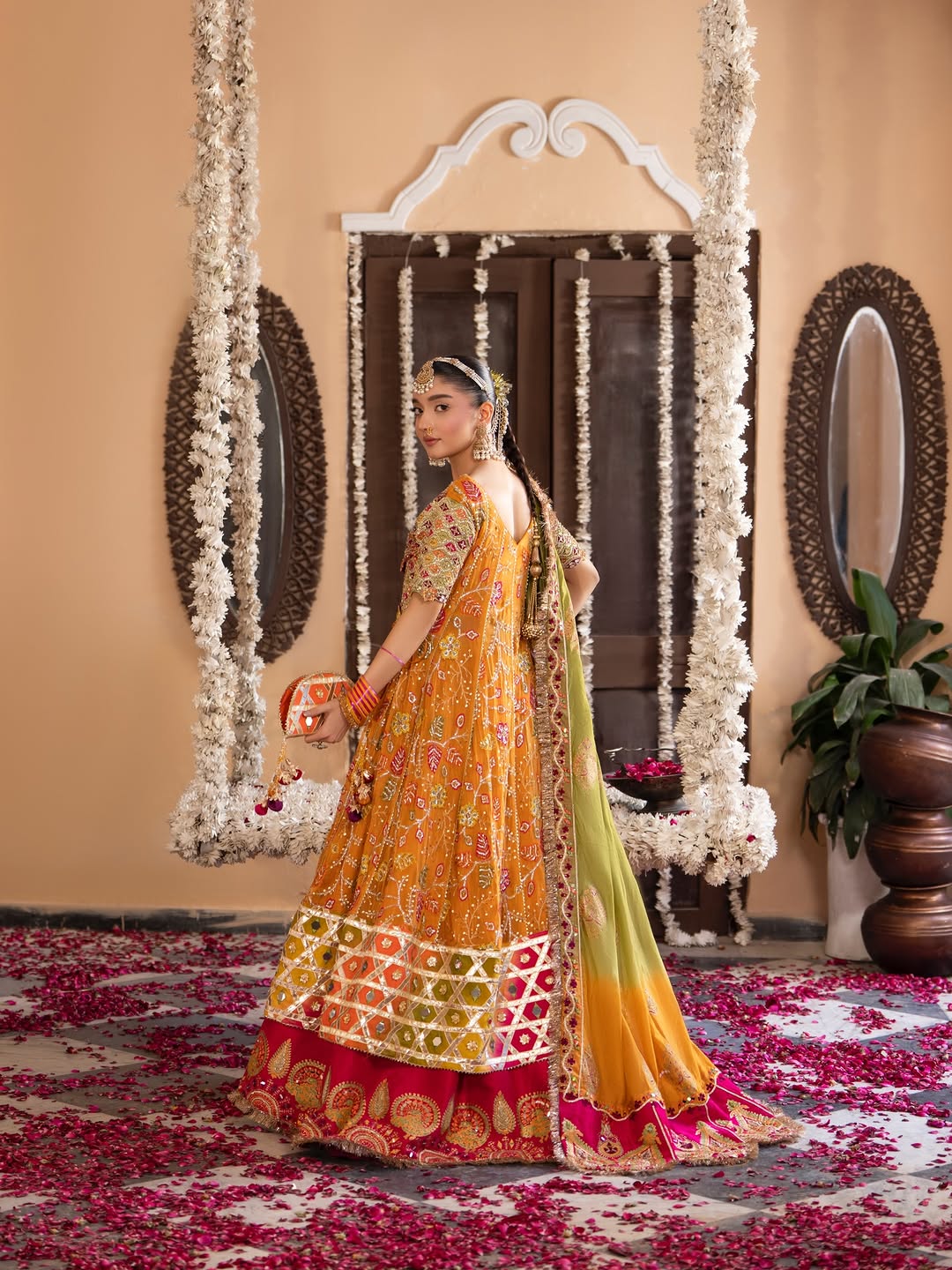 Gulnar Mehndi Lehenga – Mustard Orange Angrakha & Fuchsia Pink Bridal Lehenga Choli with Gota Work