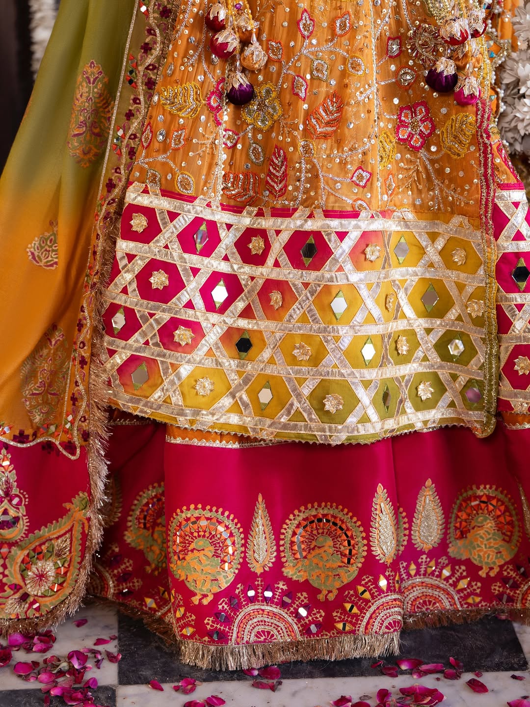 Gulnar Mehndi Lehenga – Mustard Orange Angrakha & Fuchsia Pink Bridal Lehenga Choli with Gota Work