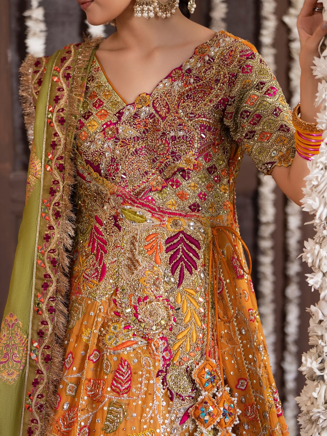 Gulnar Mehndi Lehenga – Mustard Orange Angrakha & Fuchsia Pink Bridal Lehenga Choli with Gota Work