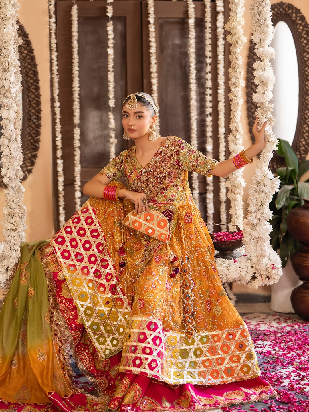 Gulnar Mehndi Lehenga – Mustard Orange Angrakha & Fuchsia Pink Bridal Lehenga Choli with Gota Work